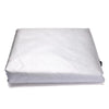 A white weatherproof patio furniture cover rolled up for storage.