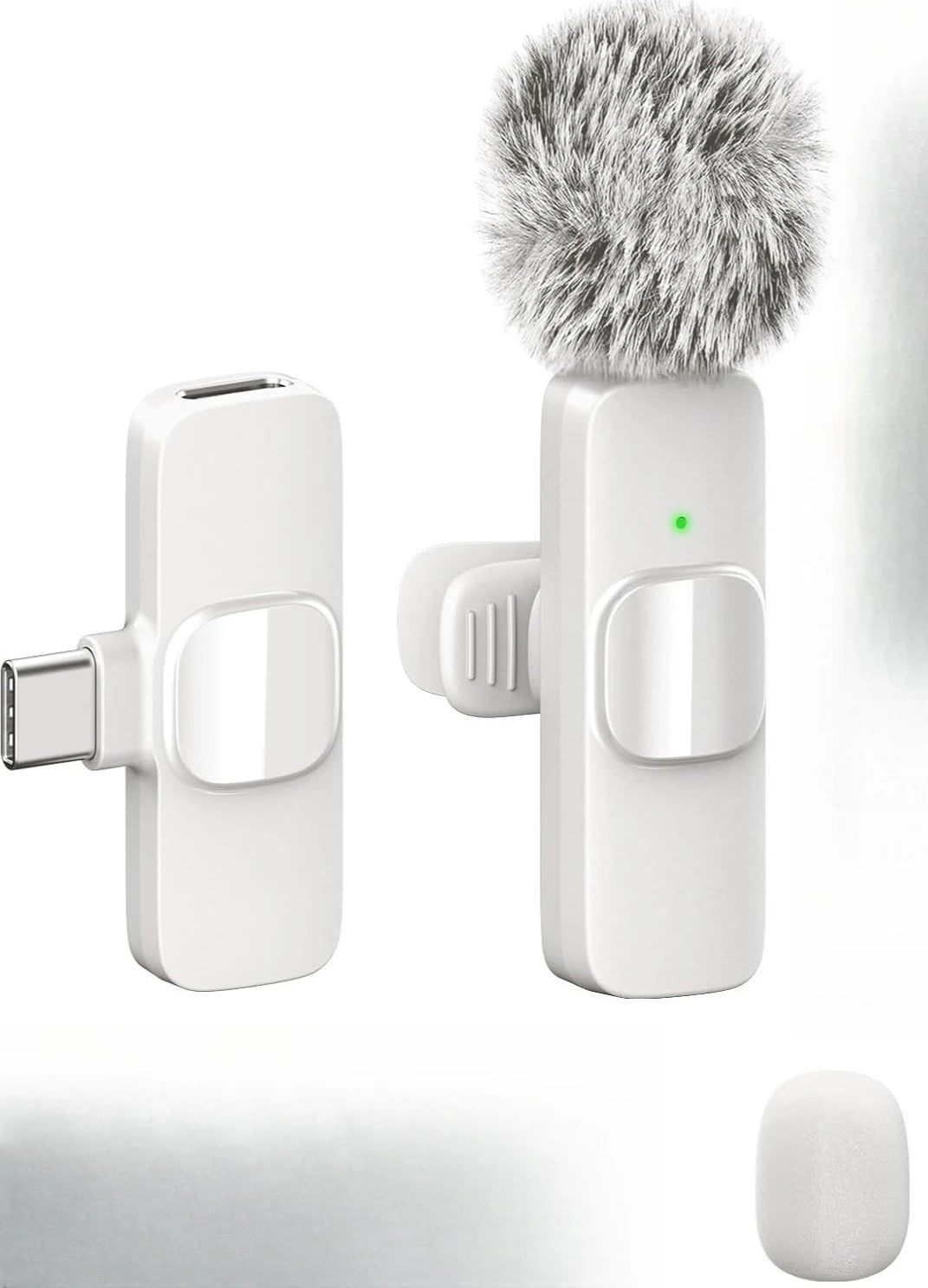A white wireless lavalier microphone with a fluffy gray windscreen and a rectangular body is shown.