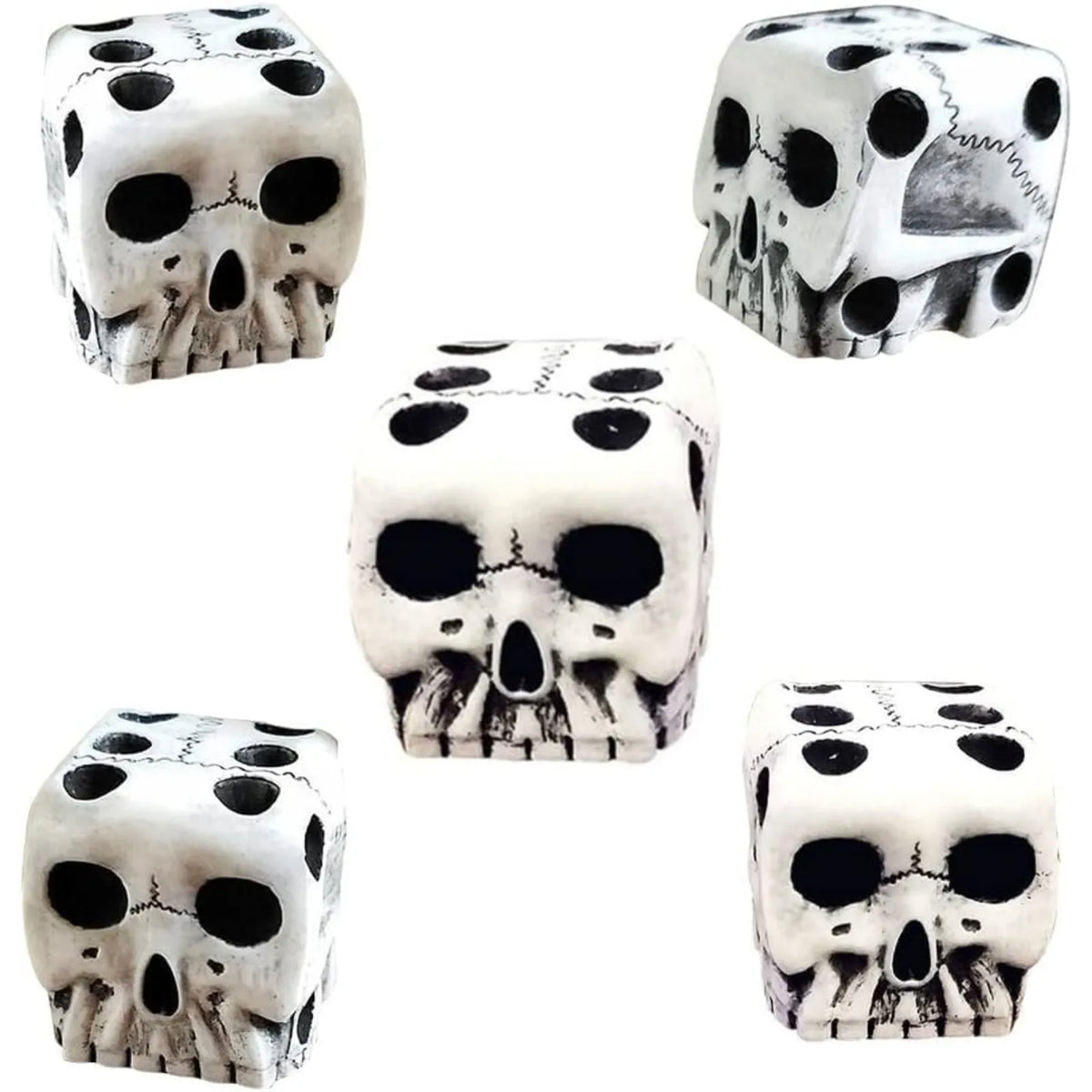 A set of white skull dice used for tabletop games and Halloween