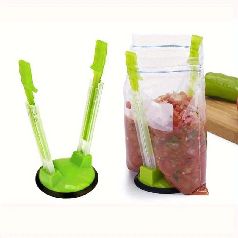 A clear plastic bag holder rack with green handles is shown next to a sealed plastic bag containing pink food.