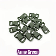 A pile of Army Green plastic side-release buckles for paracord bracelet projects.