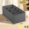 Gray fabric organizer with 8 compartments shown on a wooden surface.