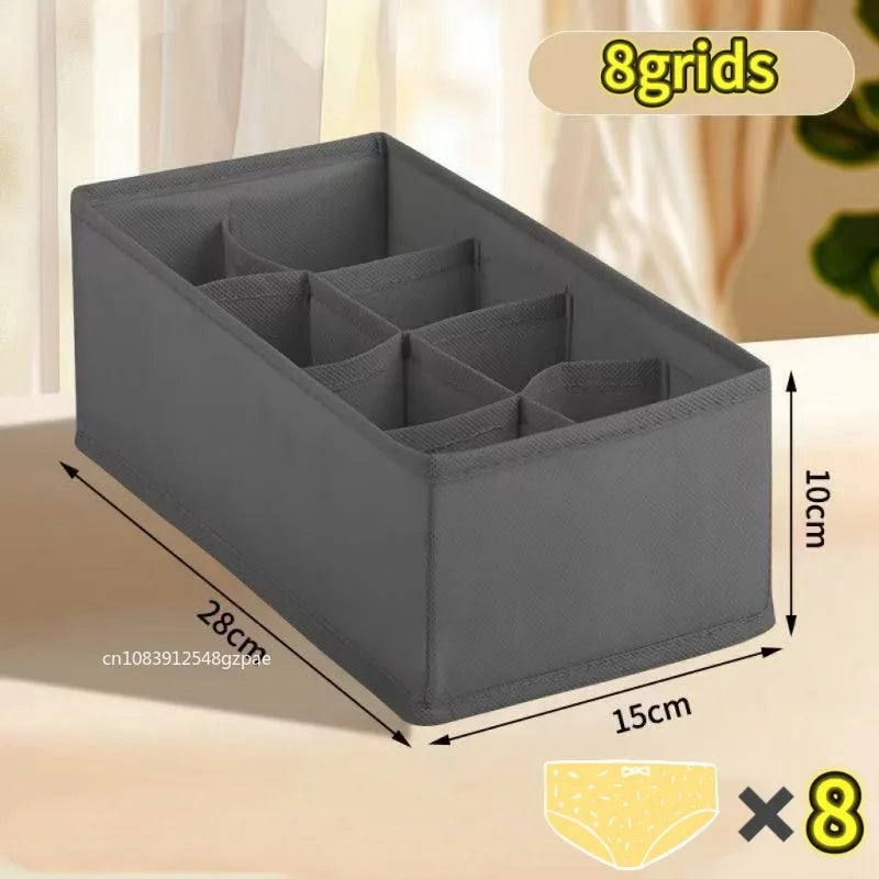 Gray fabric organizer with 8 compartments shown on a wooden surface.