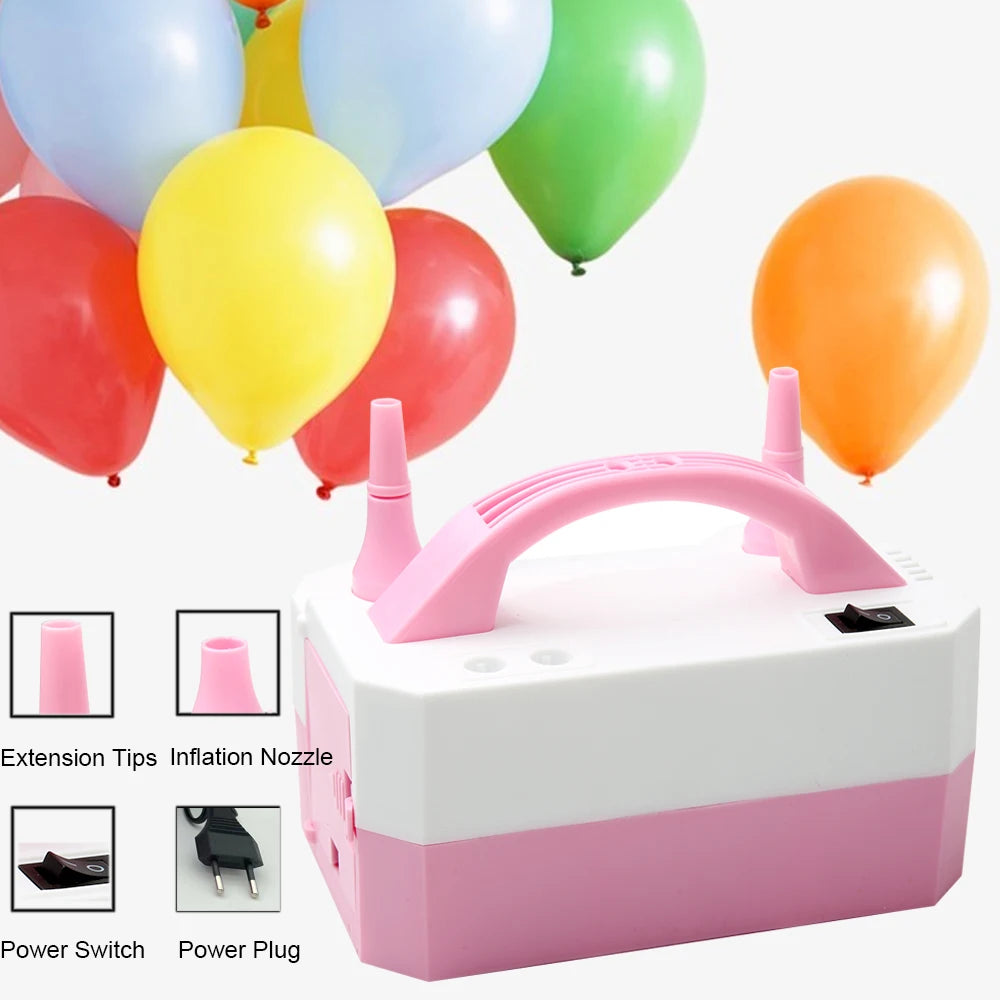 Pompe à ballons électrique rose avec deux embouts et un câble d'alimentation, entourée de ballons colorés.