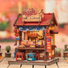 A detailed miniature kit of a Japanese street stall or book nook featuring a tiled roof and wooden facade.
