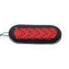 A black oval LED trailer tail light with a red lens and dynamic amber arrow turn signal.