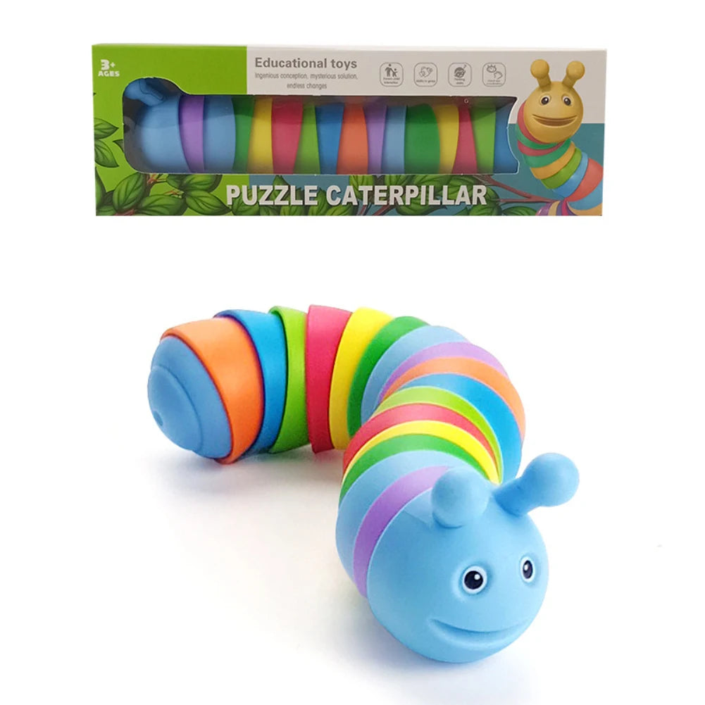 A blue articulated fidget slug toy with colorful, flexible rings, shown next to its packaging.