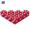 A set of ten red plastic game dice with white dots arranged in a honeycomb pattern.