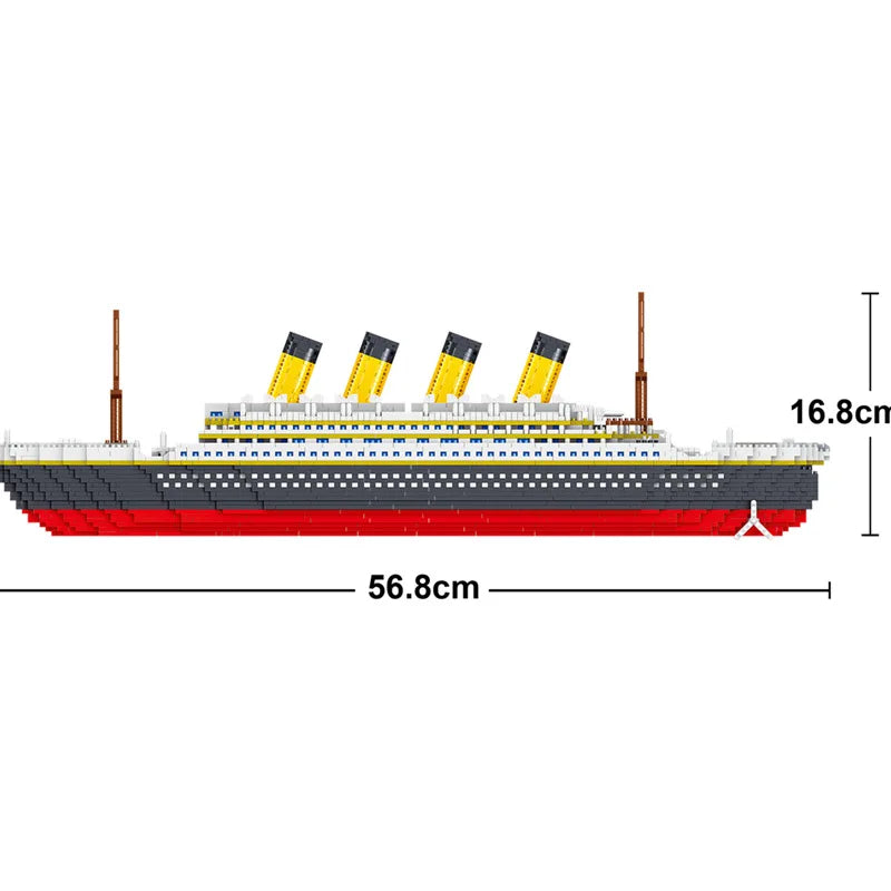A scale model of a Titanic ship built from interlocking plastic blocks, showing the hull and masts.