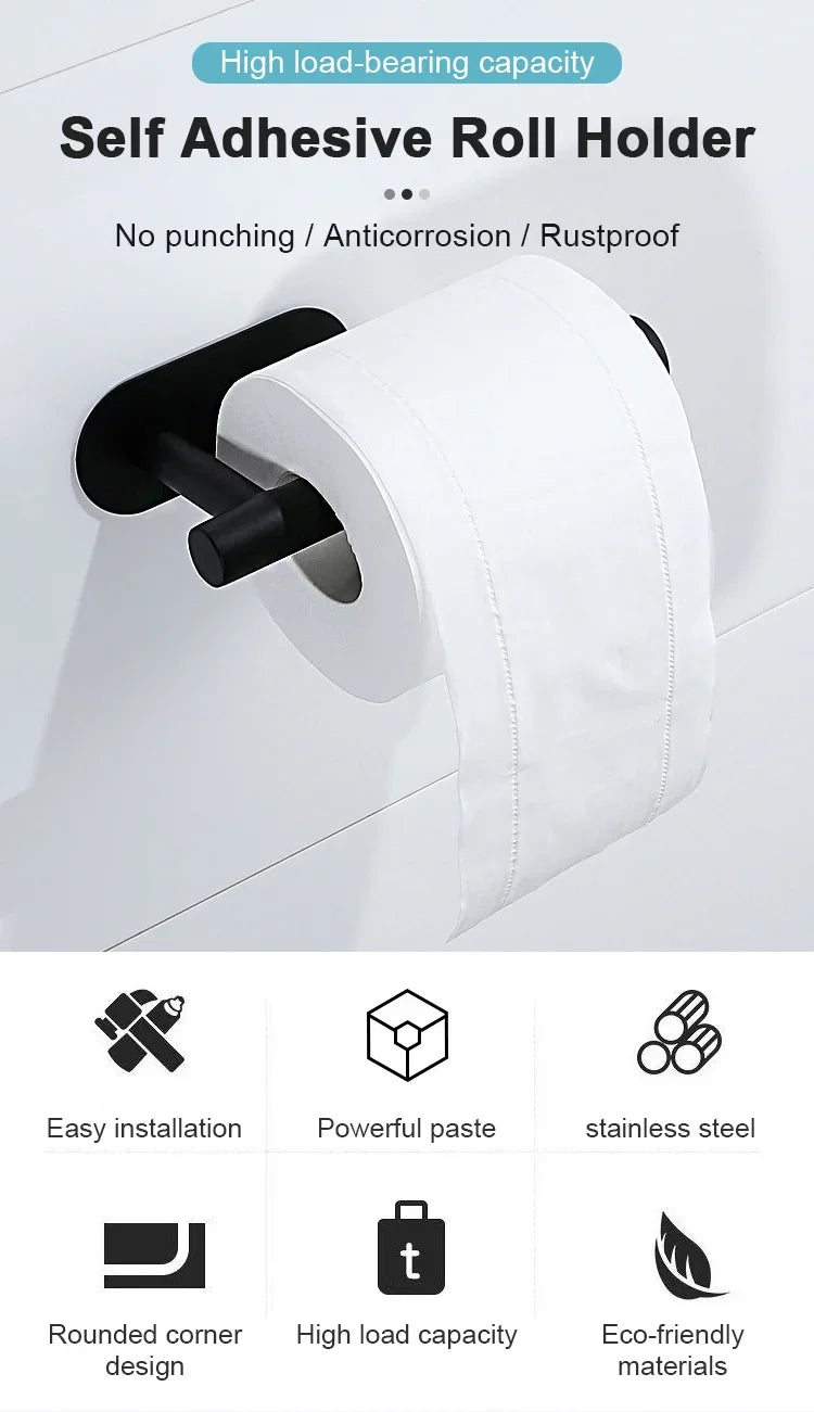 A white self adhesive roll holder made of stainless steel mounted on a white surface.