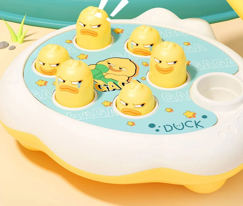 A yellow toddler hammer-pounding toy featuring several angry-faced animal designs on a light blue tray.