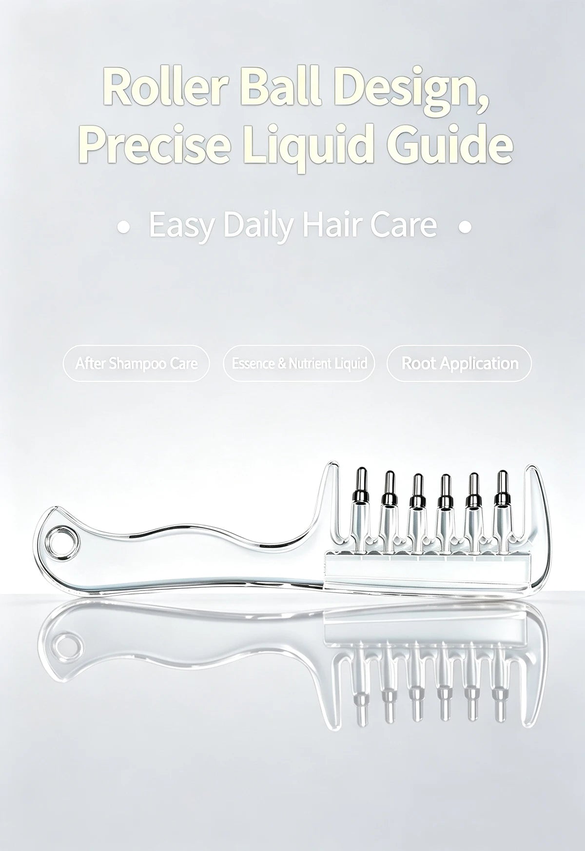A clear refillable scalp massage comb with roller ball applicator shown on a white background.