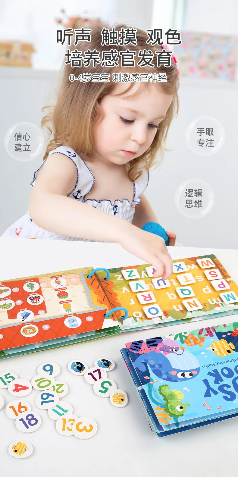 A toddler is interacting with a Montessori busy book featuring colorful matching games and letters.