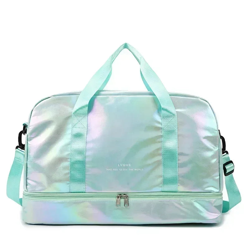A mint green iridescent duffel bag with light blue straps and a zipper pocket.