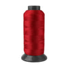 A spool of red heavy-duty nylon sewing thread for upholstery and denim.