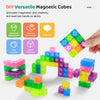 A collection of colorful, translucent magnetic cubes in various shades are shown being assembled and arranged on a white surf