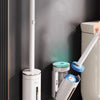 A wall-mounted disposable toilet brush set with a white handle and blue brush head is shown next to a toilet.