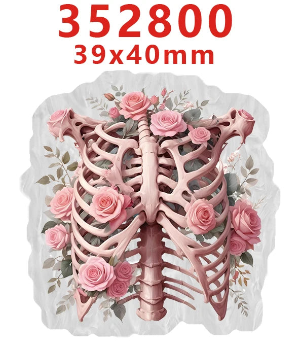 A realistic pink anatomical heart and rib cage model used as a background for nurse badge charms.