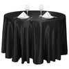 Elegant black satin round tablecloth set for events featuring glassware and silverware.