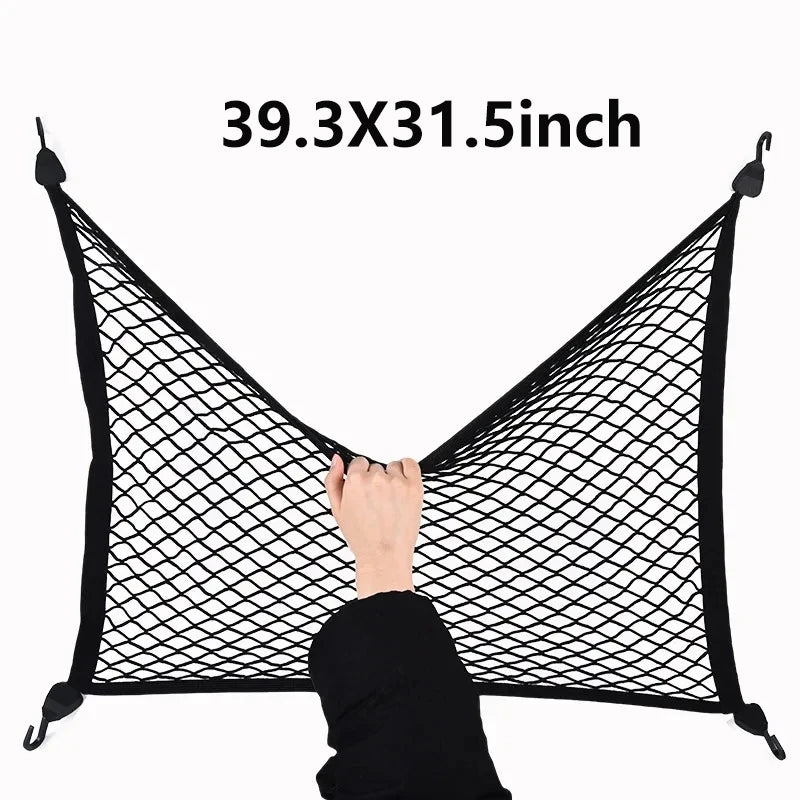 شبكة شحن سوداء مطاطية بقياس 39.3x31.5 بوصة وممسوكة بيد.