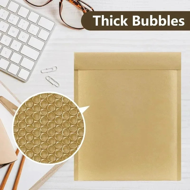 A gold kraft bubble mailer is shown next to a keyboard and a close-up of the bubble pattern.