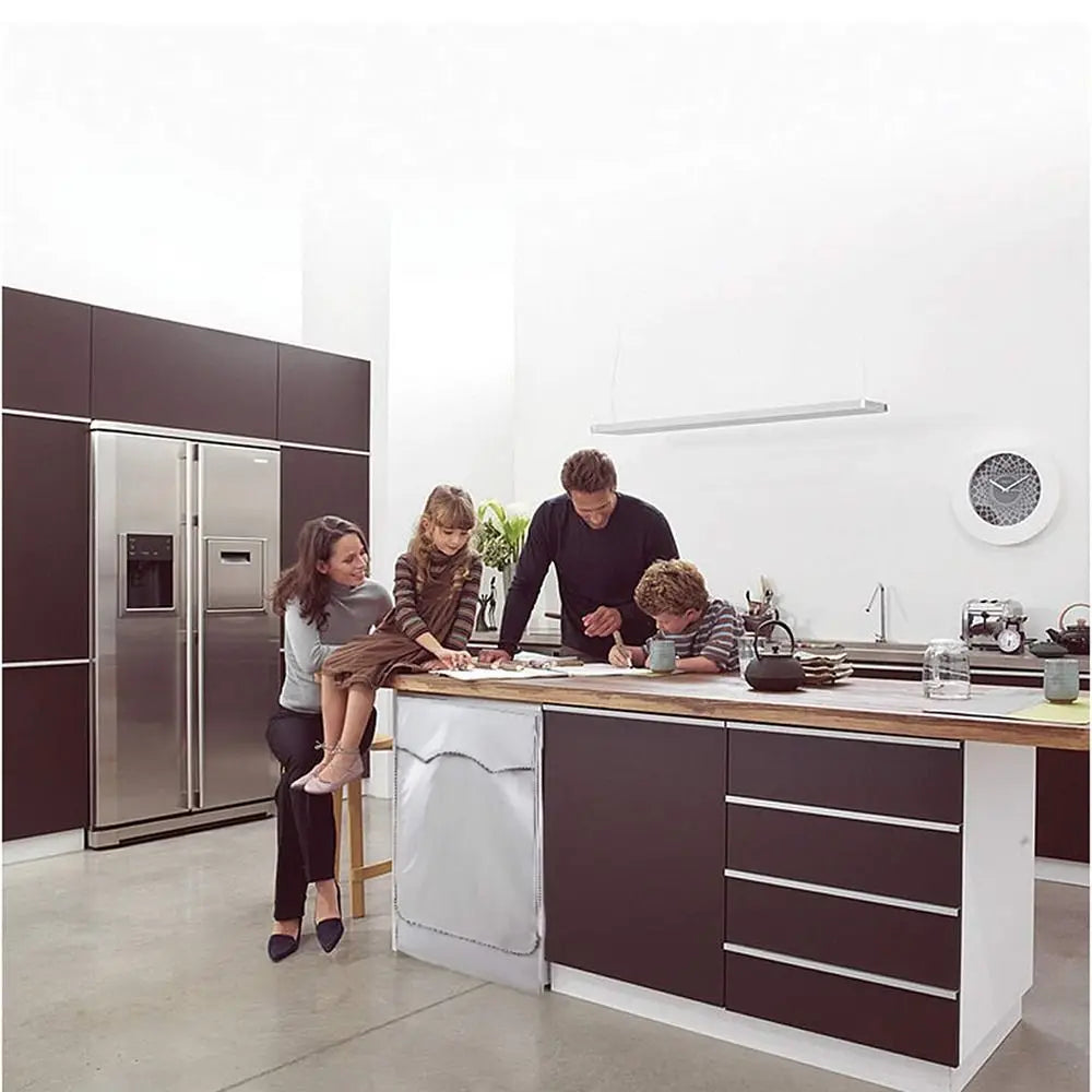 A modern kitchen counter features a stainless steel refrigerator and a wooden countertop with a white washing machine cover.
