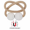 A set of eight elegant pearl magnetic curtain tie-back clips made of woven natural fiber.