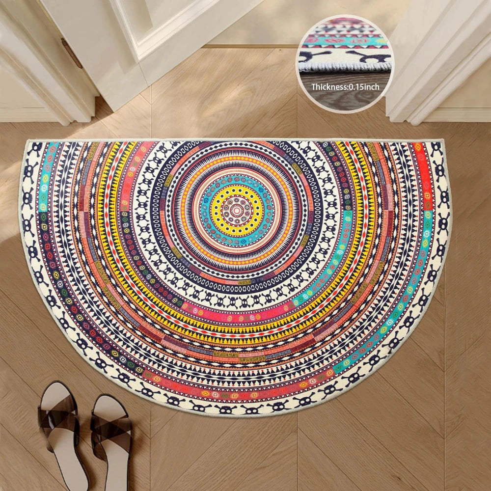 A semi-circle tribal boho doormat featuring colorful geometric patterns on a light wood floor.