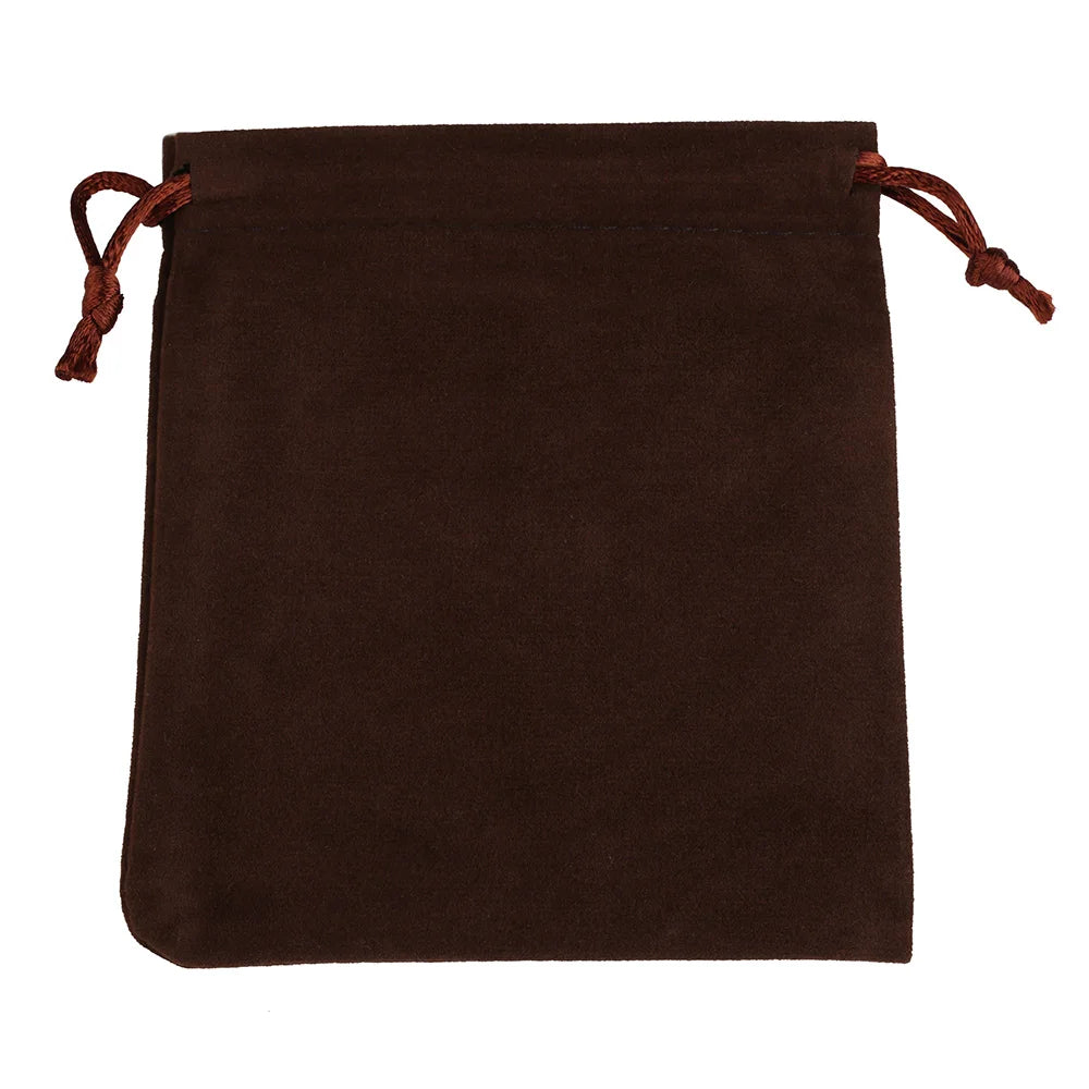 A dark brown velvet drawstring jewelry pouch with brown ties.