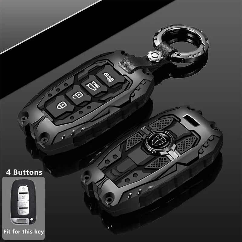 A black protective key fob cover with a metal ring, shown in a close-up view.