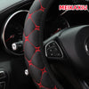 Close-up of a black steering wheel with an embroidered red diamond pattern leather cover.