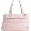 A light pink multi-functional boxy tote bag with a handle and square pockets.
