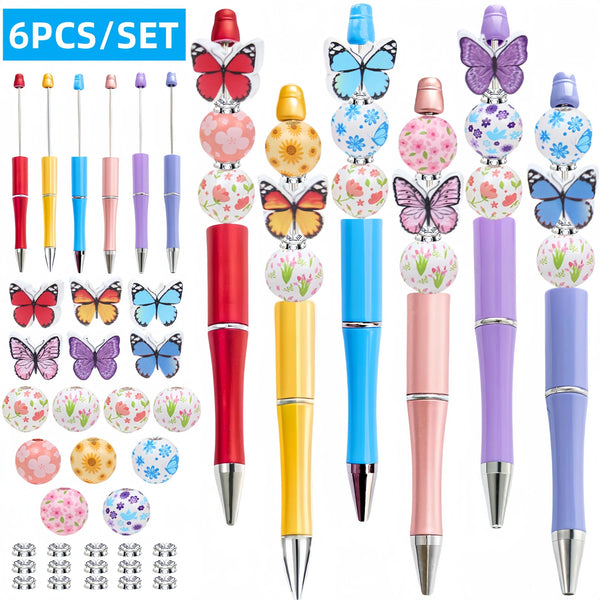 Ein Set von sechs Regenbogen-Schmetterlings- und Blumen-Perlen-Ballpunkten.