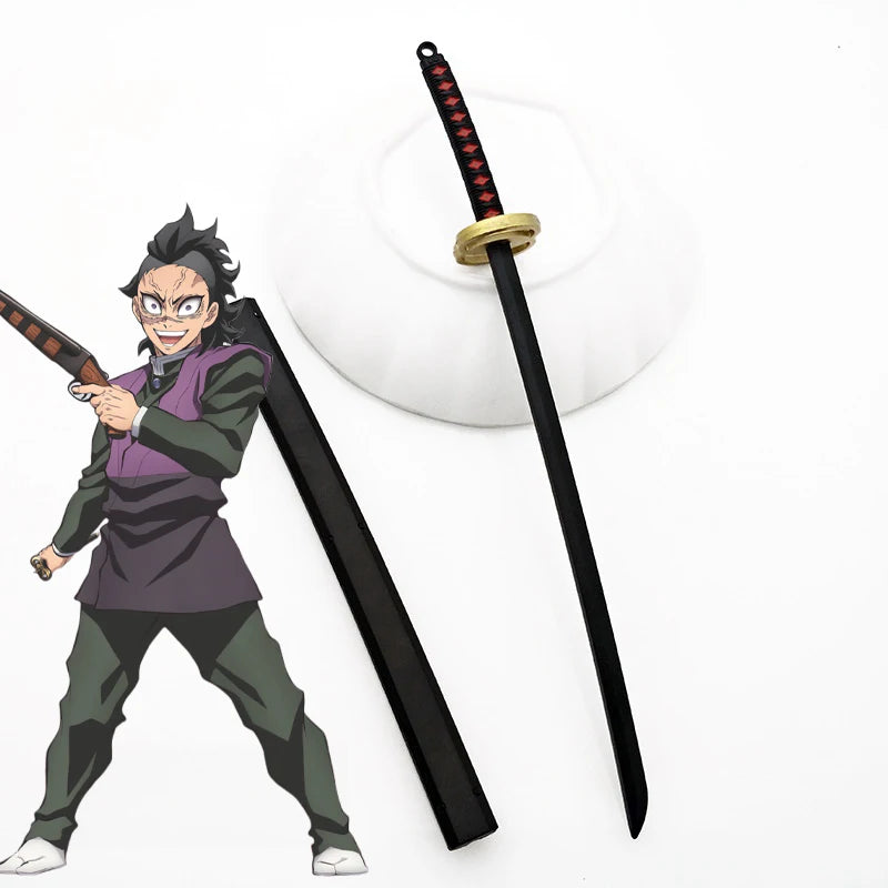 A replica metal katana sword inspired by Tanjiro, featuring a black blade and gold hilt, displayed next to an anime-style cha