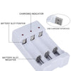 A white USB charging interface for a battery slot charger with positive and negative battery slots.