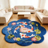 A round blue plush rug featuring a pattern of koi fish and flowers on a light wooden floor.