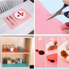 A set of pink silicone mats and a knife are shown alongside a refrigerator liner mat product.