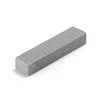 A rectangular gray pumice stone cleaning stick with a textured surface.