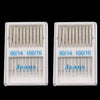 A set of stainless steel sewing machine needles for denim and jeans, packaged in clear plastic trays.