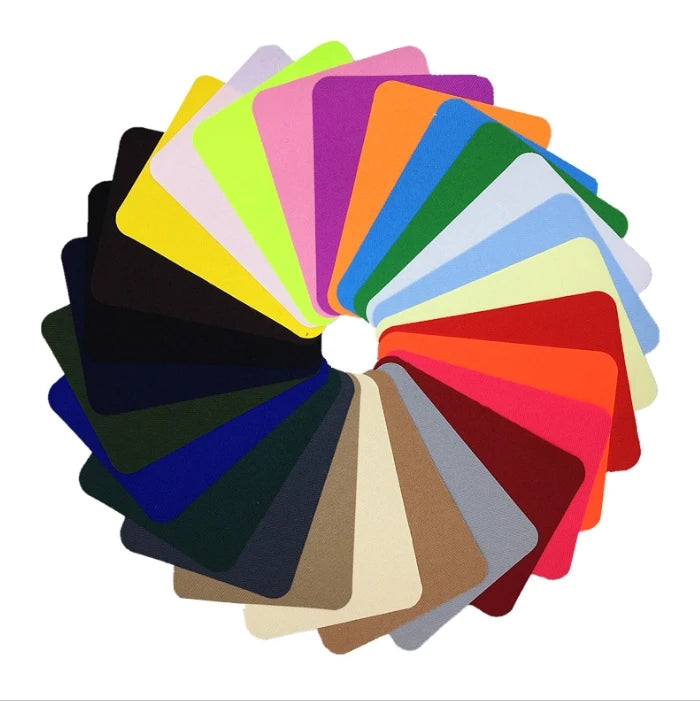 A fan of various fabric patch colors arranged in a circular display.