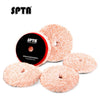 A set of orange microfiber polishing pads for professional car detailing