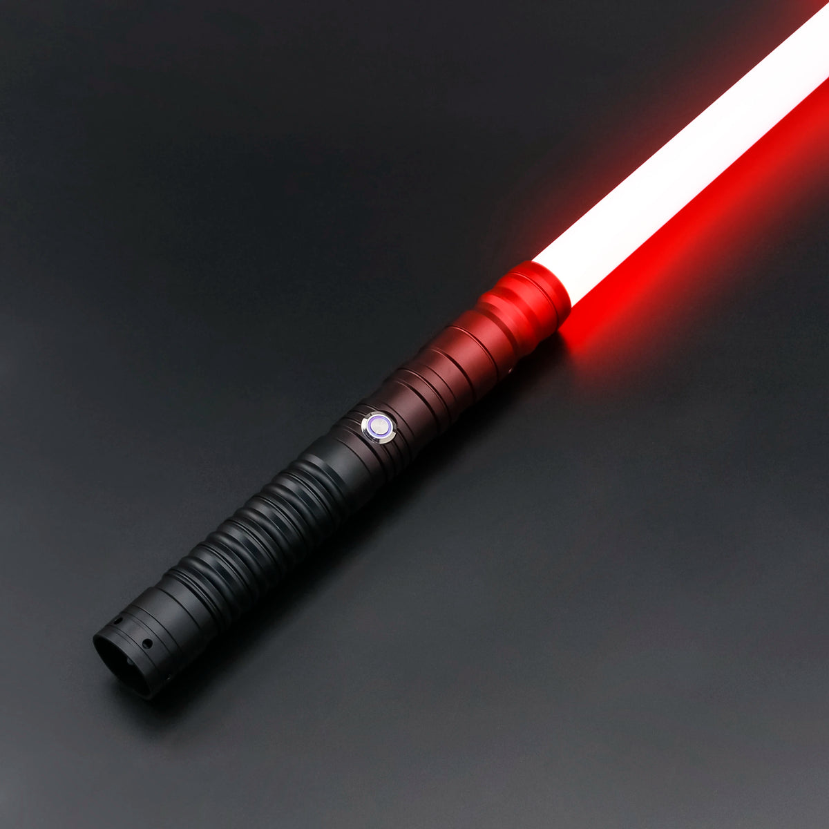 A red lightsaber with a white blade and black hilt is shown against a dark background.