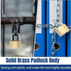 A close-up of a solid brass padlock body attached to a metal bar, demonstrating its durability.