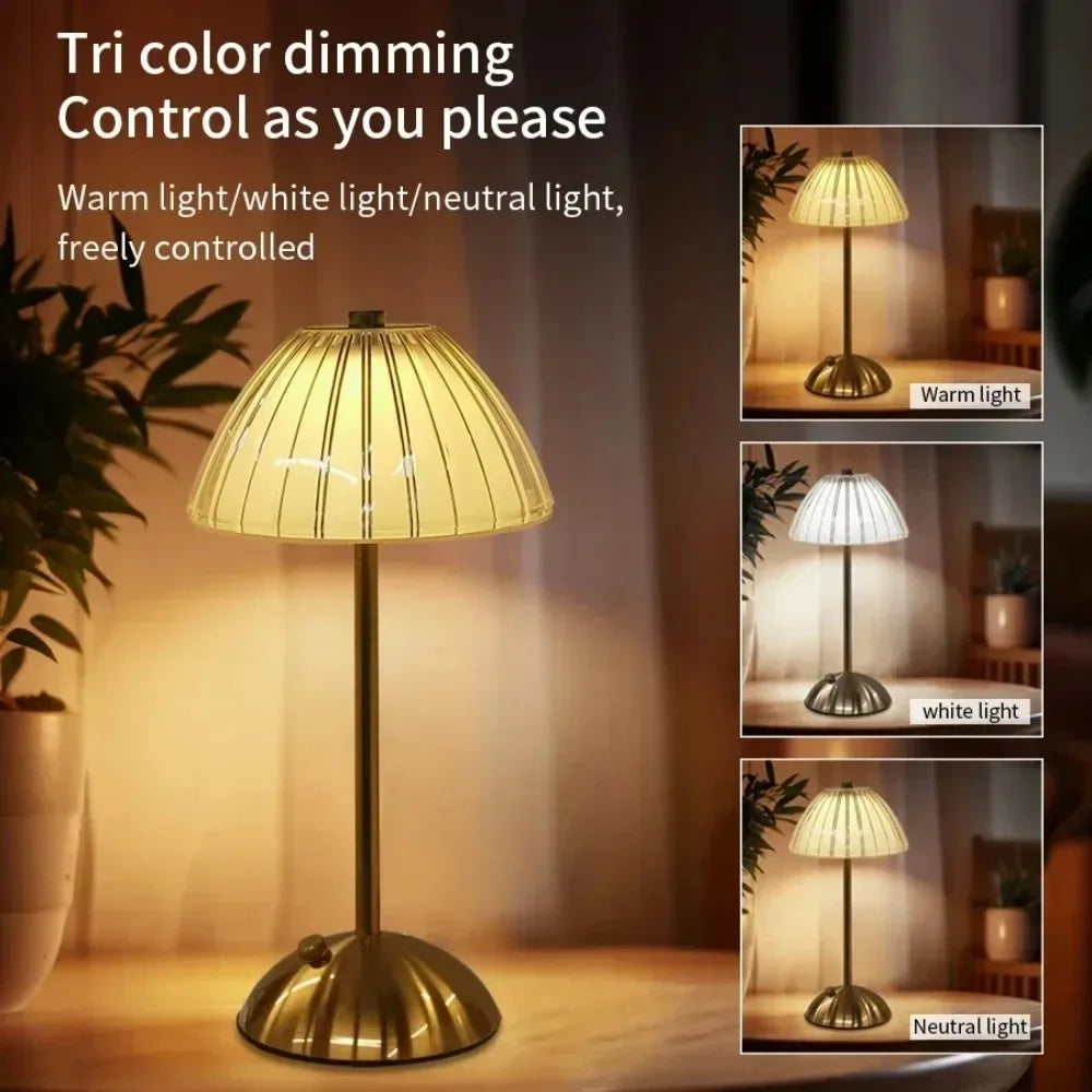 A tri-color dimming table lamp with a gold finish, showing warm light, white light, and neutral light settings.