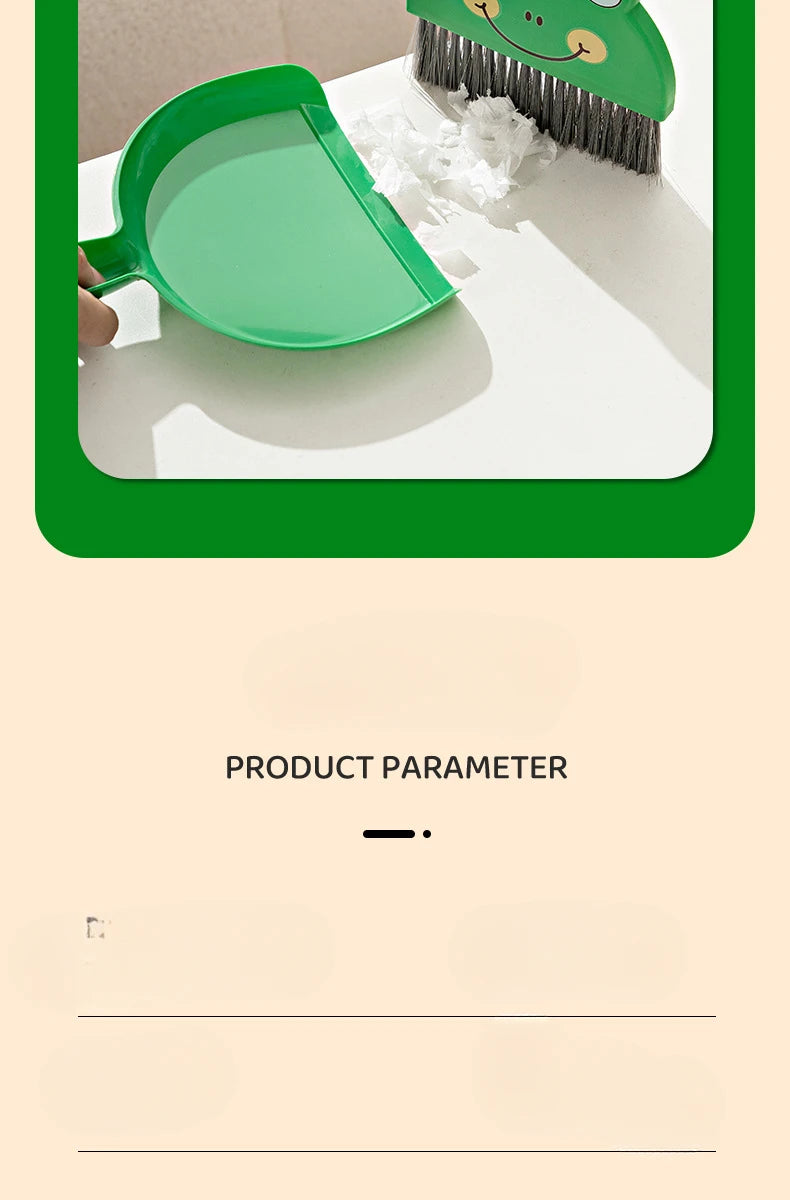 A green compact cartoon broom and dustpan set is shown on a white surface.