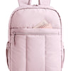 A pink padded laptop backpack with a zipper and straps is shown from the front.
