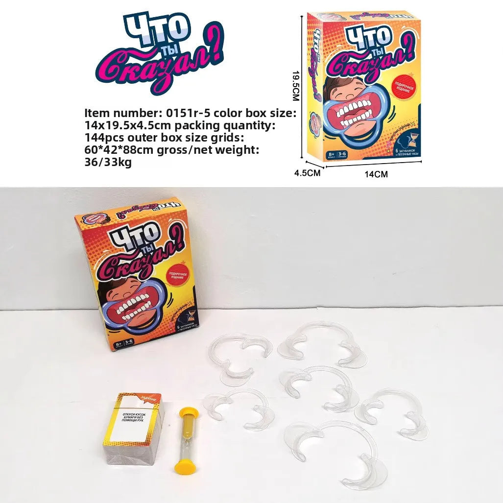 A box of a party word guessing card game with several plastic cards and a yellow plastic piece.