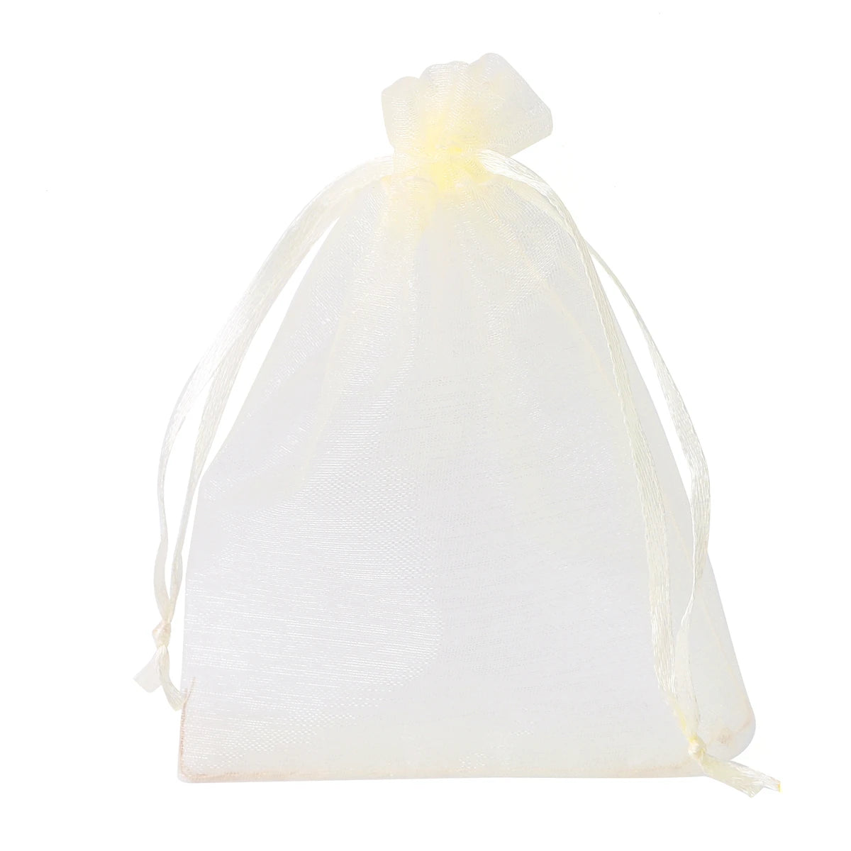 A clear organza drawstring gift bag with a yellow tag, used for storing small items.