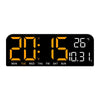 Black digital wall clock displaying the time 20:15 and a temperature of 26 degrees Celsius.