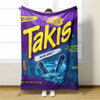 A purple Takis branded blanket is displayed hanging against a white window frame.